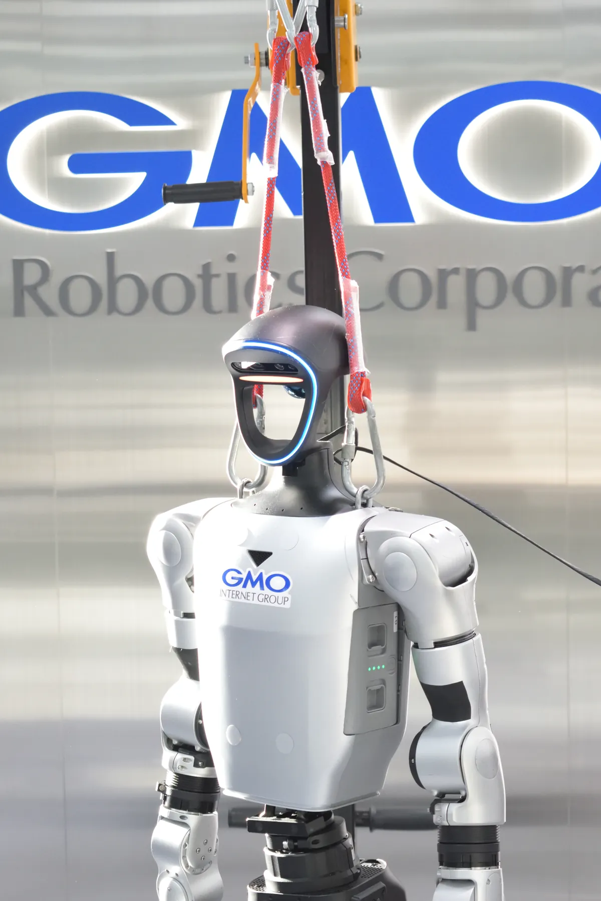 GMO humanoid robot on stand
